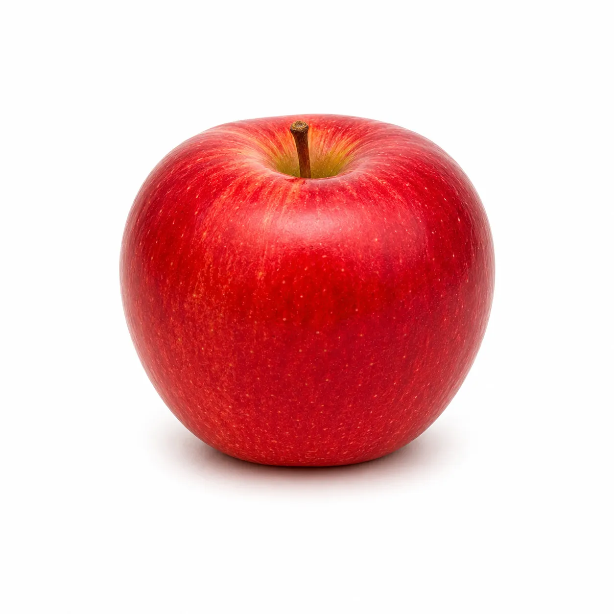 Pomme entière et coupée sur fond blanc